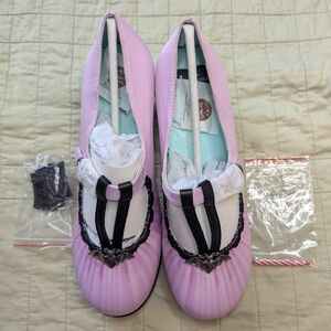 Pink Ballet Flats with Black Bow Detail